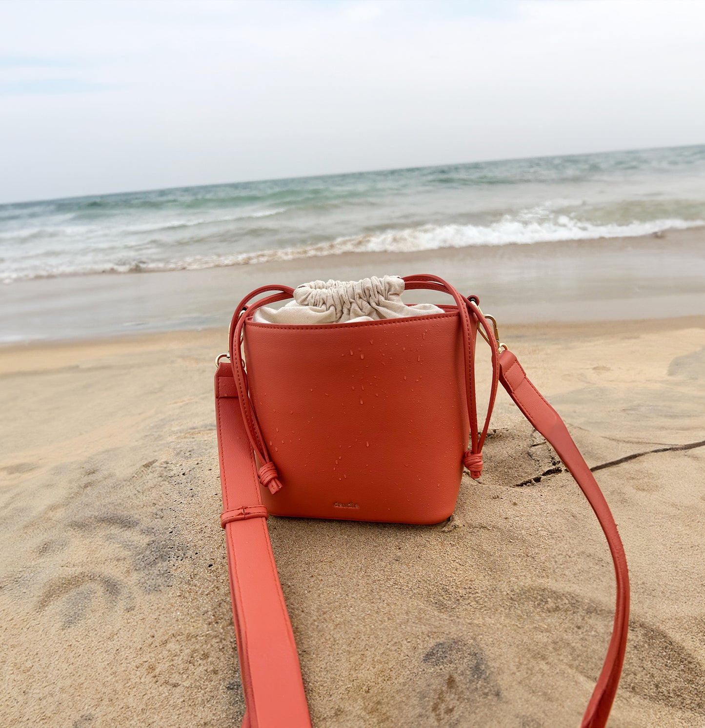Oval Bliss Drawstring Bucket Bag